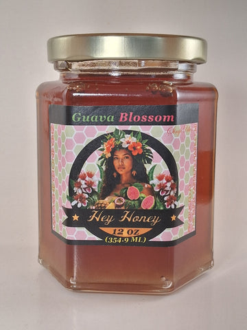 Guava Blossom Hawaiian Honey 12 oz hexagonal glass jar — semi-dark raw honey with caramel, butterscotch & maple tropical finish | HeyHoney.biz