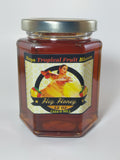 Mango Tropical Fruit Blossom honey 12 oz hexagonal glass jar with gold lid — deep amber single-pollen Hawaiian raw honey | HeyHoney.biz