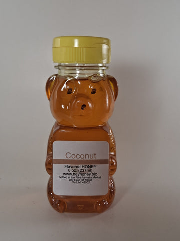 Honey bear container with a label on a white background