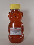 Peach Flavored Honey 12oz bear-shaped jar — Michigan raw honey with sweet peach flavor | HeyHoney.biz