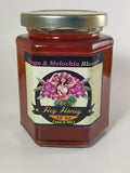 Mango & Melochia Blossom honey 12 oz hexagonal glass jar with gold lid — Hawaiian bi-floral raw honey | HeyHoney.biz