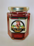 Tangerine Blossom honey 12 oz hexagonal glass jar with gold lid — deep amber single-pollen Hawaiian citrus honey | HeyHoney.biz